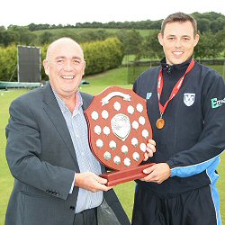 Skipper, Iain Parkhill, receives O'Neill's Ulster Shield from Managing Director of sponsors O'Neill's.