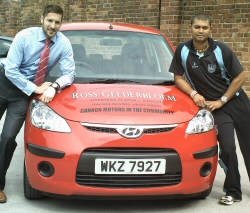 Cannon Motors' Peter Morgan, pictured presenting Hyundai i10 to Carrickfergus Cricket Club's Ross Gelderbloem.