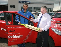 Cannon Motors' Gibson McWharry, pictured presenting Hyundai i20 to Carrickfergus Cricket Club's Ross Gelderbloem.