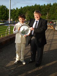 Andrew Palmer receives trophy from NCU President, Ian Gourley.
