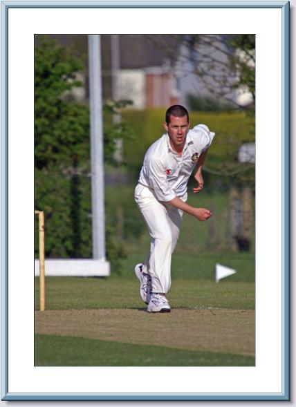 Latimer in bowling action